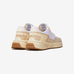 Sneakers vegan unisexes crème et jaune de la marque iné, disponibles du 36 au 46