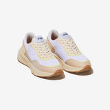 Sneakers vegan unisexes crème et jaune de la marque iné, disponibles du 36 au 46