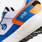Sneakers vegan unisexes orange et bleu de la marque iné, disponibles du 36 au 46