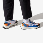 Sneakers vegan unisexes orange et bleu de la marque iné, disponibles du 36 au 46